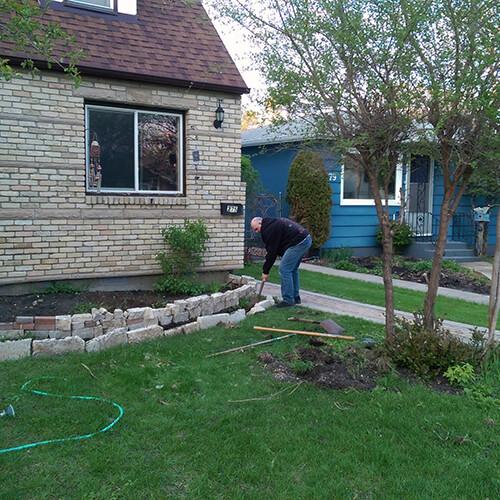 Conrad working in the garden