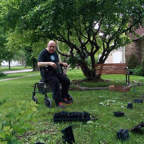 Michael Planting Flowers